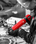 Person using Air Caulking Gun With Continuous Release For 8-1/2 Inch Cartridges 50 X 210mm on mechanical part