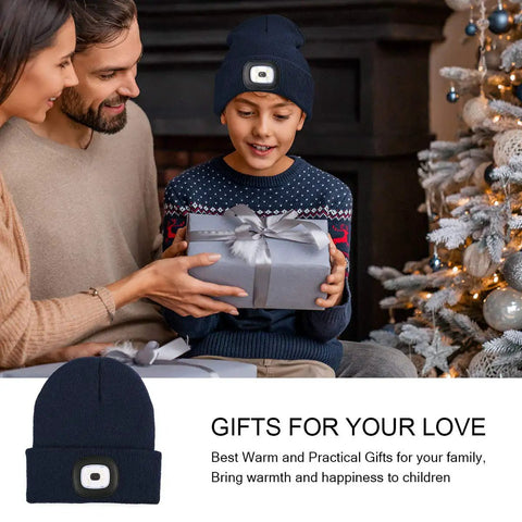 Child with navy blue Hands Free LED Beanie With USB Rechargeable Headlamp For Kids Unisex Winter Knit Cap Lighted Hat