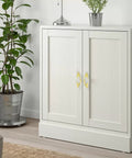 Furniture cupboard with French Provincial Vintage Drawer Pulls 5 Inch Cabinet Handles in gold finish, European style, shabby chic design.