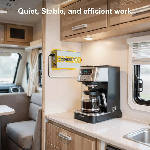 1200W Pure Sine Wave Inverter 12V DC To 120V AC With LCD Display GFCI Outlet installed in RV kitchen, powering a coffeemaker