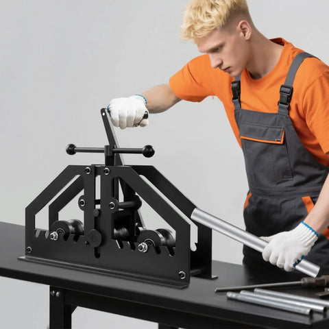 Heavy Duty Manual Tube Roller Bender With Ergonomic Handle For Rolling Round Steel Pipe Up To 1.5 Inches in use, shaping metal tubing.
