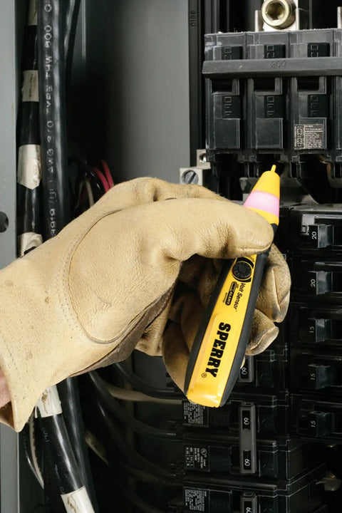 Dead Simple Adjustable Non Contact Voltage Sensor Tests 12 To 1000 V AC Fast With Loud Audio Tone And Clear Flashing Light Tough Rubberized Handle For Real Deal Electricians Today testing in electrical panel.
