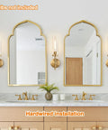 Modern Brushed Gold Wall Sconces Set Of Two With Clear Glass Hardwired Adjustable Up Or Down Vanity Light Fixture For Bathroom Smooth Vibe Upgrade displayed in a bathroom with mirrors.