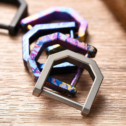 Alloy Miniature Keychain Clip With Detachable Tool And Screwdriver in vibrant multicolor on a wooden surface