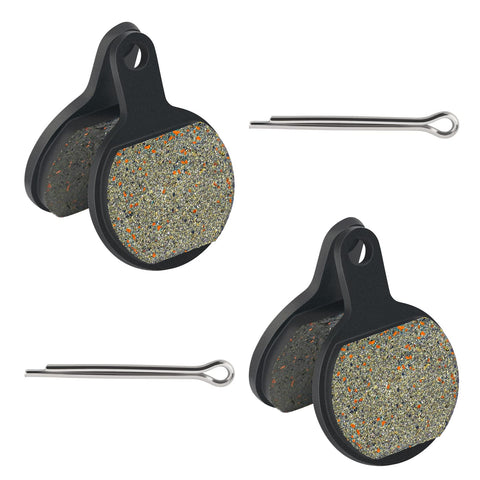 Two black Tektro IOX.11 disc brake pads with speckled friction material and mounting pins