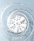 Ultra Compact Cordless Washing Machine With Rechargeable Battery And Three Gentle Wash Modes spinning in water, showcasing its cleaning action.