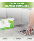 Hand wearing clear glove from 500 Pack Clear Disposable Gloves for Cleaning and Food Prep, wiping surface with a cloth