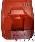 Close-up of C 4/12 50 Battery Charger for Cordless Systems 110V Black with ruler showing connector size