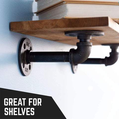 Shelf mounted with one half inch by one inch black pipe nipple ten pack malleable cast iron close nipples for dope industrial decor.