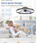 Woman relaxing with a dog under ZMISHIBO 2 Pack 24 Inch Ceiling Fans with Lights and Remote, Black in a bright room.
