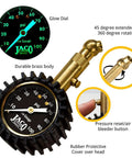 Front view of JACO Elite Tire Pressure Gauge with glow dial, brass body, 0-100 psi scale and rubber cover.