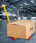 Heavy Duty Machinery Skate Dolly Moving Cart With 6614 Lbs Capacity Carbon Steel Frame Three Swivel Wheels transporting a cardboard box in a warehouse.