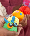 Game Changing Modeling Compound Haul With 65 Mini Cans showing colorful clay creations in kids' hands