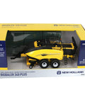 1/32 Scale New Holland Big Baler 340 Plus Diecast Model in packaging with six square bales, free rolling wheels, 10 inch long