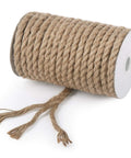 Heavy Duty 50 Foot 8mm Jute Rope For Crafts And Cat Scratcher Posts Bundling And Hanging Natural Thick Twine Durable Jute For DIY Projects And Home Decor, showing rolled coil of brown twine.