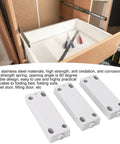 Magnetic Touch Push Open Latch With Adjustable 30 To 50 Newtons Suction installed in a cabinet with tools nearby