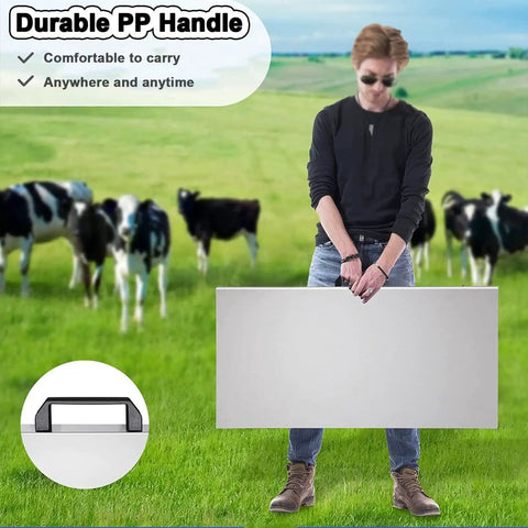 Person holding Heavy Duty Workhorse Electronic Platform Scale Built Tough For Livestock Shipping Large Breed Dog Weighing Multi Purpose commercial grade scale in green field.