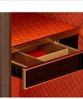 Open drawer of a compact home safe box for personal valuables made from steel with shock proof construction