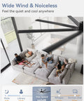 Massive 84 Inch Industrial Ceiling Fan With DC Motor, 8 Reversible Aluminum Blades, in a living room setting, overhead view.