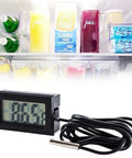 Five Piece Digital LCD Fridge Thermometer Set With Probes Fahrenheit Only Water Temperature Monitoring Minus 50F To 230F Range Easy Readout Kitchen Gadget For Your Fridge At Home in front of open fridge