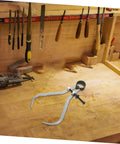 The Real Deal Heavy Duty Outside Caliper For Woodturning Precision Measuring Tool Built Tough Using Premium Carbon Steel on a woodwork bench.