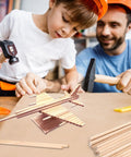 Child and adult crafting with Hassle Free 25 Pack Wood Dowel Rods 3/8 Inch By 15 Inch Smooth Unfinished Craft Sticks.