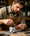 Powerful Mini Bench Grinder With 100W Brushless Motor delivers fast 6000 RPM grinding action for sharpening metal blades.