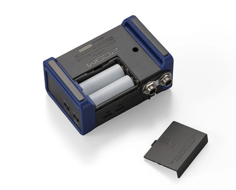 AMS 24 USB Audio Interface For Musicians And Podcasters with battery compartment open showing connections.