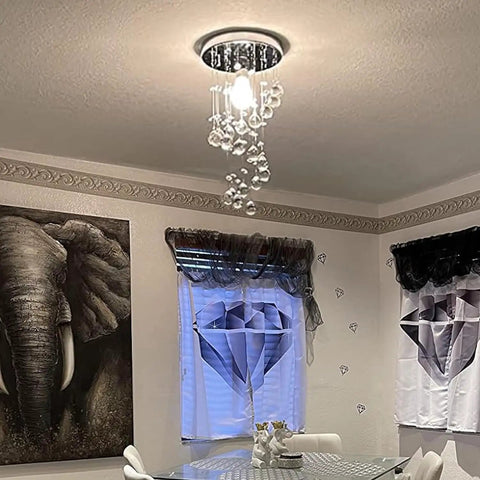 Spiral Crystal Chandelier Flush Mount with raindrop crystal orbs in dining room, 8 inch diameter by 15.8 inch height