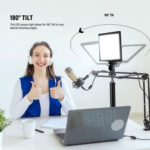 9 Inch LED Video Light Panel With Dimmable Output on desk with tripod stand, illustrating 180° tilt feature for studio lighting