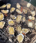 Grilled oysters on BBQ grill for backyard seafood prep using Premium Stainless Steel Oyster Opener With Knife On Wooden Base