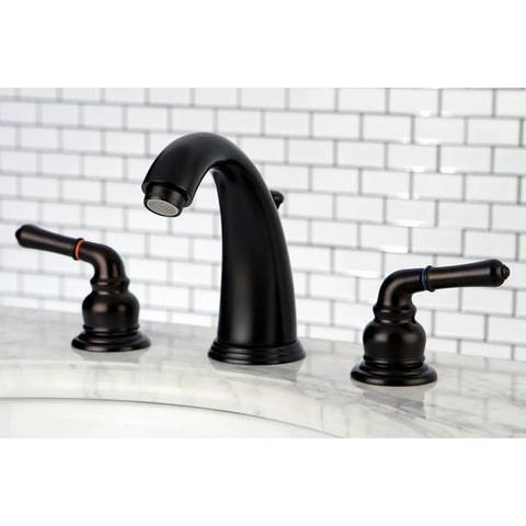KB985 Magellan II Widespread Lavatory Faucet With Brass Pop Up In Oil Rubbed Bronze on marble countertop, classic design