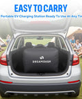 Portable EV charging station in car trunk, ready to use outside camping, featuring a compact design for easy transport.