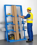 Worker organizing materials on Vertical Bar Rack Heavy Duty Steel Storage Shelf For Long Parts And Lumber In The Garage Basement 3000 Lb Capacity Upright Shelving Pipe Organizer Pro Grade Shop Organizer Beast.
