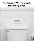 Do Not Flush Sign For Bathrooms White Acrylic Five By Three Point Five Inches mounted above toilet tank