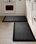 2-Piece Cushioned Anti-Fatigue Kitchen Mats for Floor Waterproof Non-Slip Comfort Standing Rugs Built for Long Kitchen Shifts in Black 17.3x28 Inches Each, two mats placed on kitchen floor