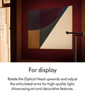 Solarcycle Morph Floor Light CF06 Smart Multi Mode Lamp with artwork in room for display, highlighting lighting features.