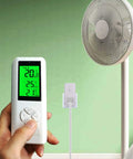 Hand holding remote for Wireless Thermostat Outlet With Digital Temperature Controller For Cooling And Heating Plug In