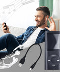 Man using Compact Portable MP3 Player With 1.8 Inch LCD Display Multifunction Music Player Earphones Included Aluminum Body Palm Size Black