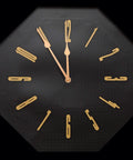 Black clock face with gold numbers, showcasing hands from Two Pack Quartz Clock Movement Kit With Hands For DIY Wall Clocks Replacement Mechanism 31mm Shaft