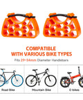 Clip On Bike Stabilizer And 30mm Elevation Tool For Inverted Parking Easy Flip And Clean Setup With No Slip Rubber Straps Fits 29 To 34mm Handlebars For Road Mountain And E Bike Maintenance Orange image showing orange stabilizers with honeycomb design and rubber straps, compatible with road and mountain bikes.