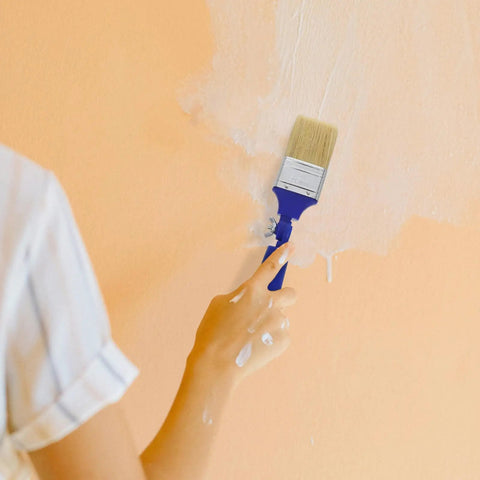 Person painting wall with 2 Inch Adjustable Angled Paint Brush For Fine Detail And Corners, Synthetic Bristles For Walls, Furniture, Art, And Deck Stain, Easy To Clean, Flexible Head, Ideal For DIY Projects And Pro Level Craft.