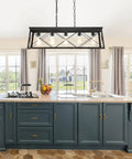 Five Light Dining Room Chandelier in Black and Brush Gold Finish over kitchen island, modern linear ceiling light