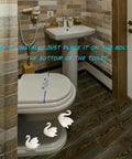 Totally Spiff Up Your Powder Room With These Decorative Ceramic Toilet Bolt Covers Featuring Chic Swan Screw Caps For A Fresh Vibe And Zero Stress Hardware Refresh, shown on toilet.