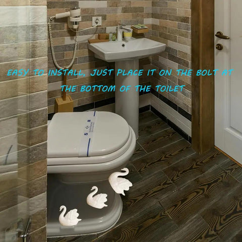 Totally Spiff Up Your Powder Room With These Decorative Ceramic Toilet Bolt Covers Featuring Chic Swan Screw Caps For A Fresh Vibe And Zero Stress Hardware Refresh, shown on toilet.