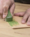 Using honing compound on leather strop, part of the All In One Pro Grade Diamond Sharpening Kit With 180 600 And 300 1000 Grit