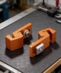 Heavy Duty Low Profile Cnc Side Pressure Plate Kit With T Track Claw Clamps For 3018 Router 6063 Aluminum workholding fixture on workbench.