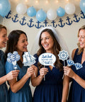 Women holding Last Sail Before The Veil Photo Booth Props Kit 24 Nautical Bachelorette Party Decorations with Anchors Rings.