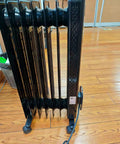 Side view of Oil Filled Radiator Space Heater With LED Display 1500W Portable Electric Heater For Home on wooden floor