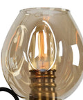 Industrial Six Light Ceiling Pendant With Amber Glass Shade Vintage Iron Chandelier For Bars Cafes Living Rooms close-up of amber glass shade.